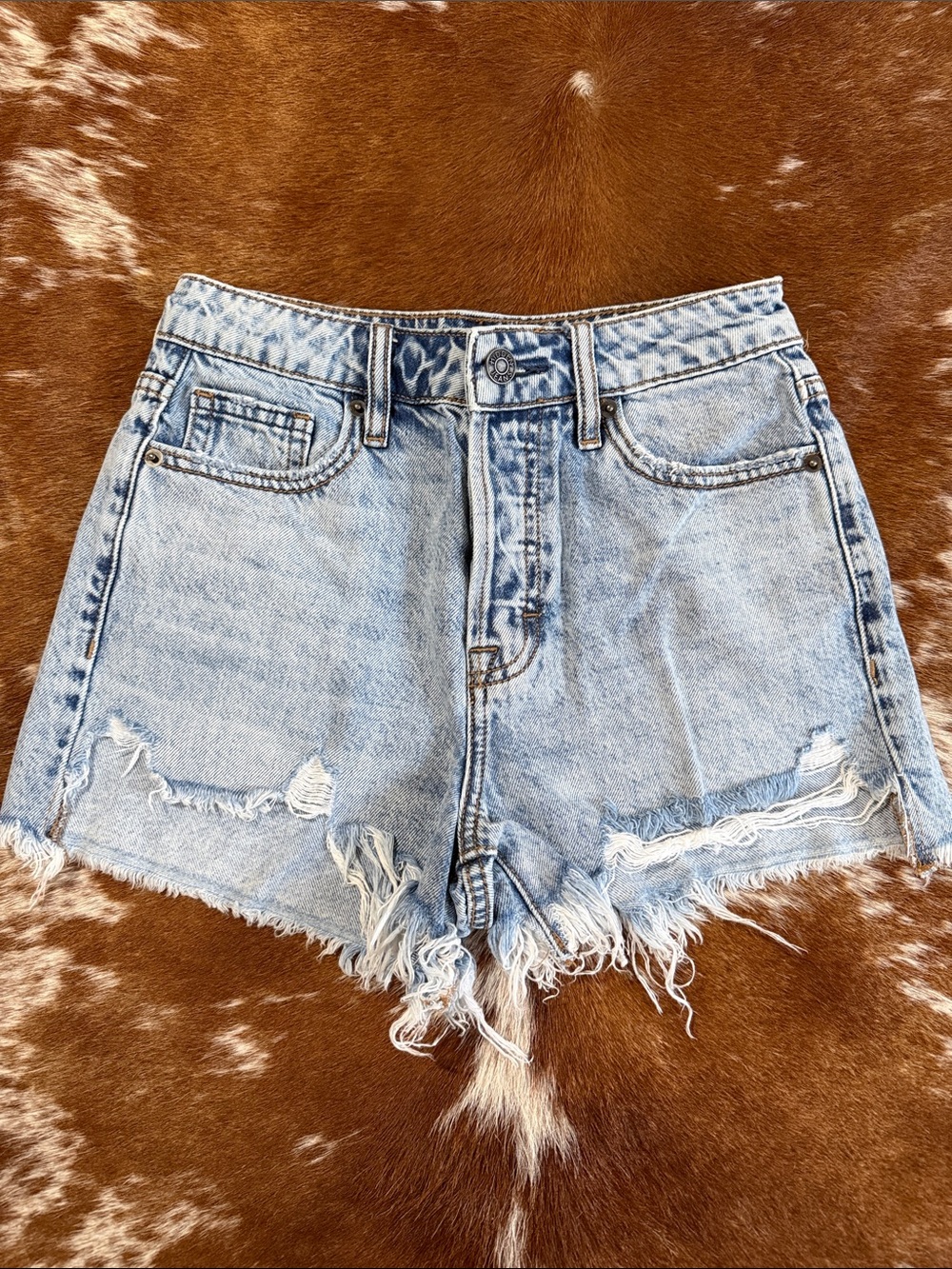 High-Rise Light Wash Distressed Denim Shorts